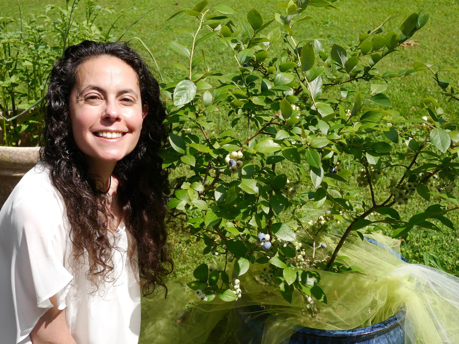 Cheryl and blueberry plant